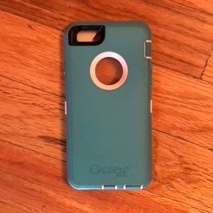 Light blue and white otter box defender case